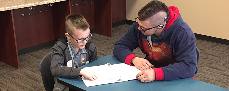 Students and parents at student-led conferences